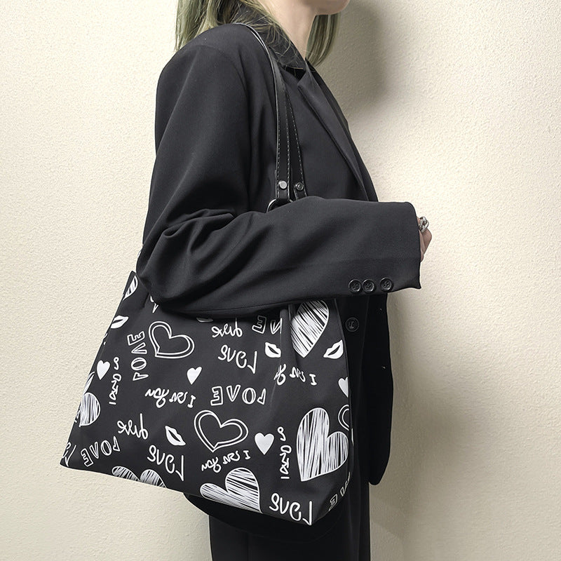 2025 Fashion women's bag printed bag bucket underarm chain bag, Korean version portable women's bag New new casual tote bag
