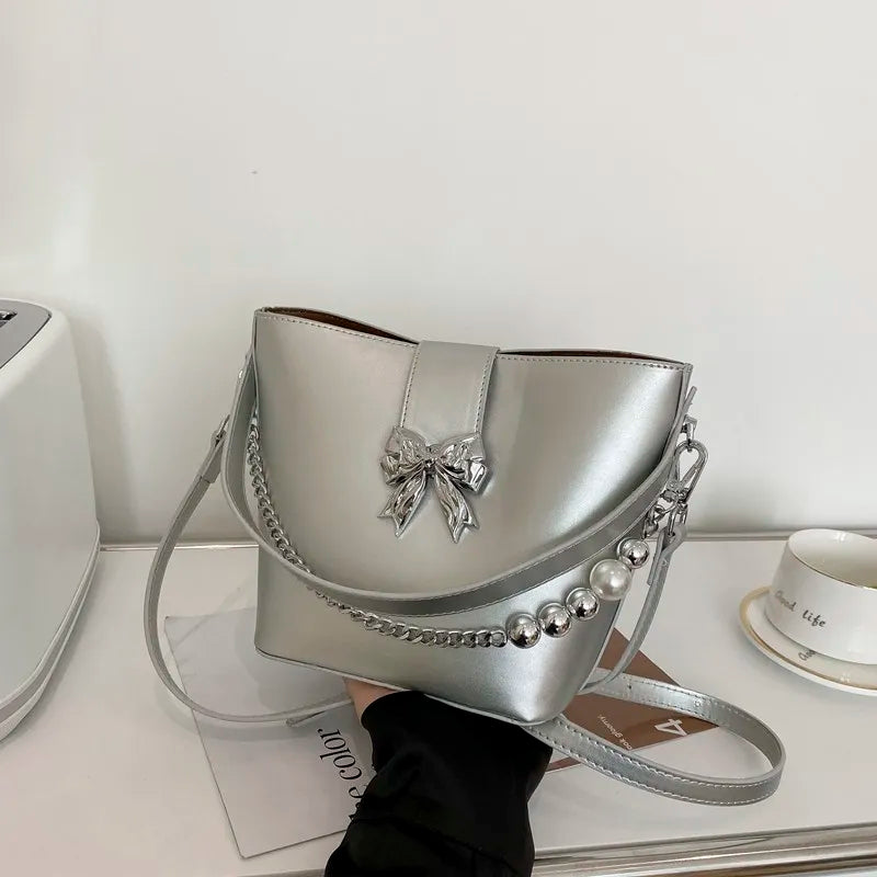 nvxiot - Spring/Summer 2024 new, solid color PU women's shoulder bag, silver bow decoration, fashion trend