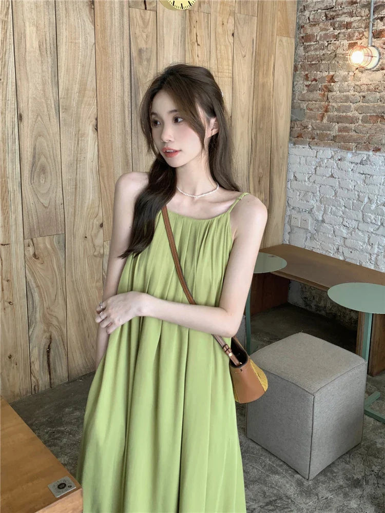 MQTIME - Elegant and versatile dress for women's summer 2024 new seaside vacation style beach skirt pleated suspender long skirt