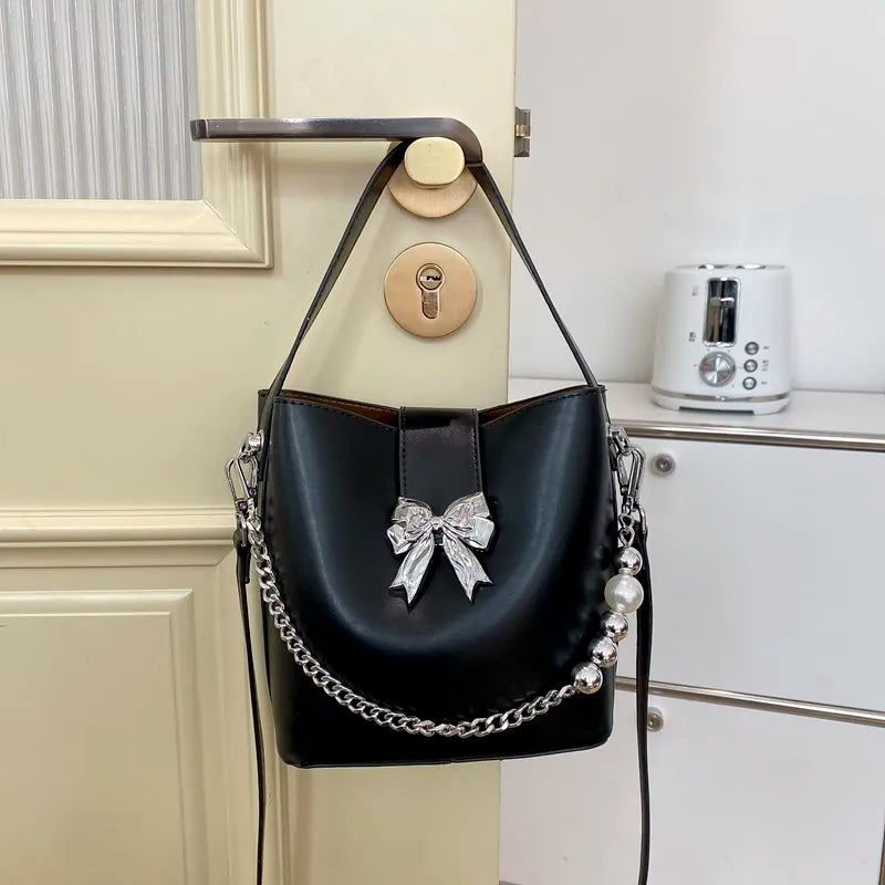nvxiot - Spring/Summer 2024 new, solid color PU women's shoulder bag, silver bow decoration, fashion trend
