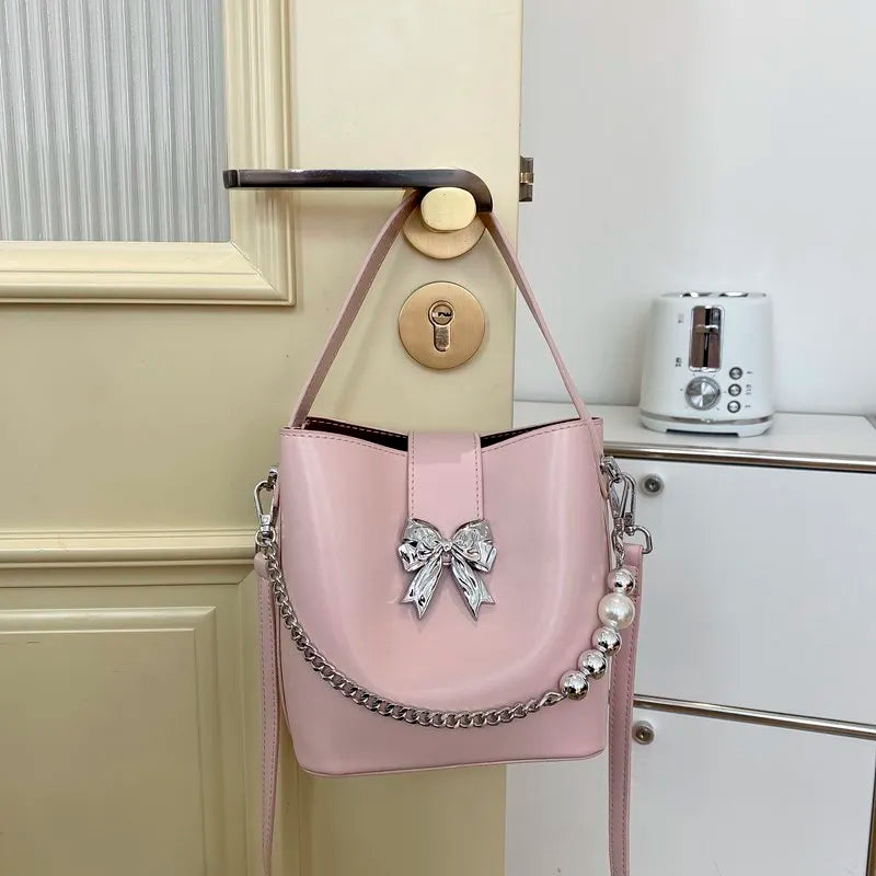 nvxiot - Spring/Summer 2024 new, solid color PU women's shoulder bag, silver bow decoration, fashion trend