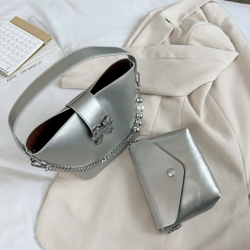 nvxiot - Spring/Summer 2024 new, solid color PU women's shoulder bag, silver bow decoration, fashion trend