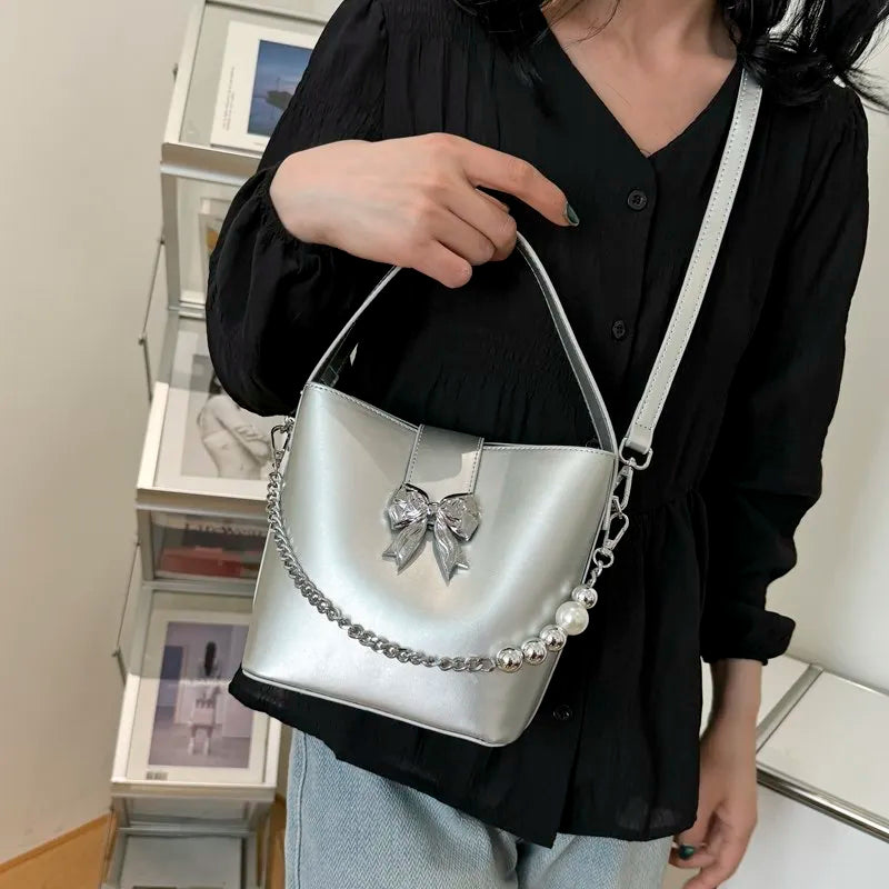 nvxiot - Spring/Summer 2024 new, solid color PU women's shoulder bag, silver bow decoration, fashion trend