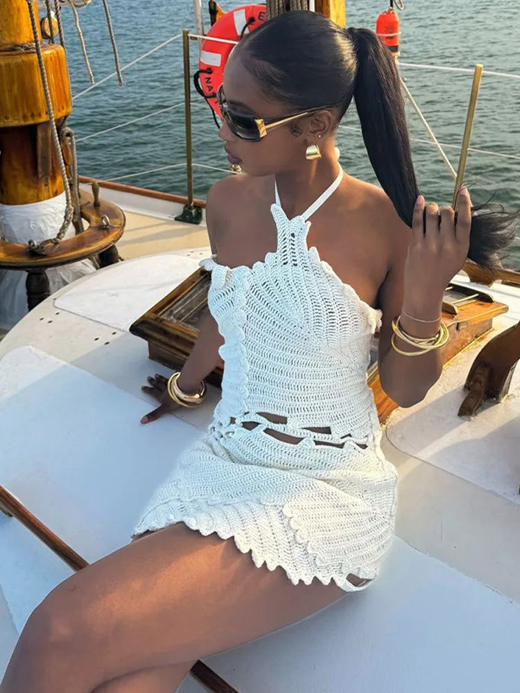 nvxiot - Knitted Hollow Out Mini Dresses Women Backless Sleeveless Halter Short Dress Lady Elegant Chic Slim Fit Robes Beach Holiday