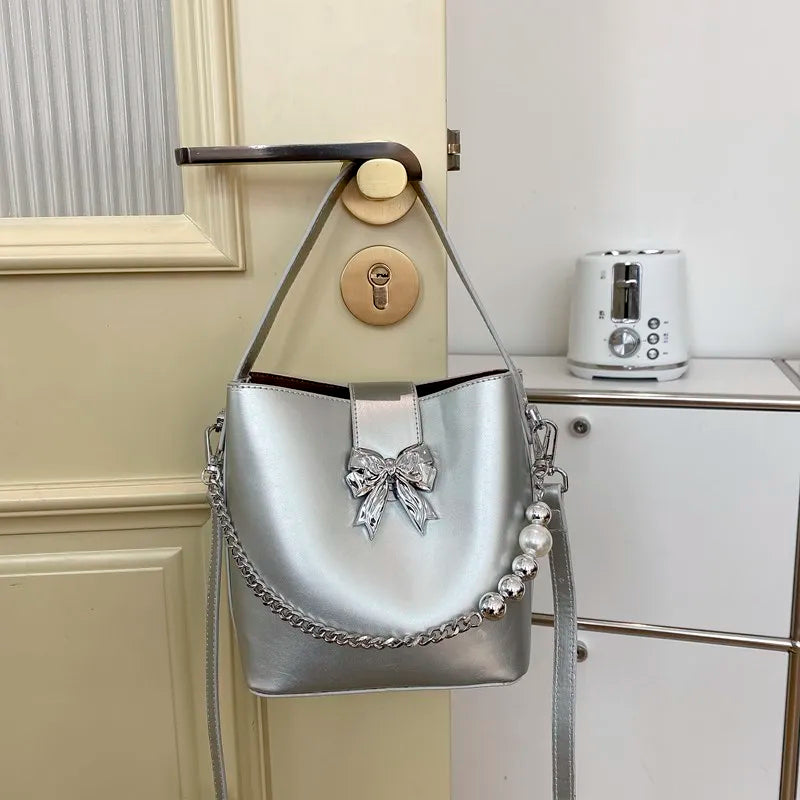 nvxiot - Spring/Summer 2024 new, solid color PU women's shoulder bag, silver bow decoration, fashion trend