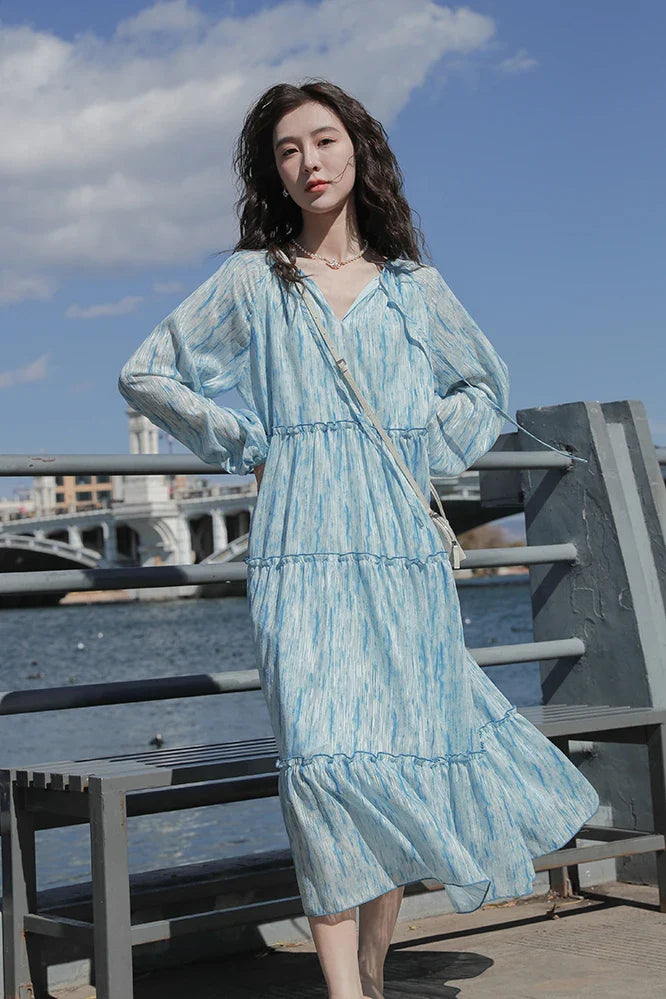 nvxiot  -  Spring 2024 new French floral holiday style long sleeved dress for women's fashion beach style dreamy blue beach long skirt