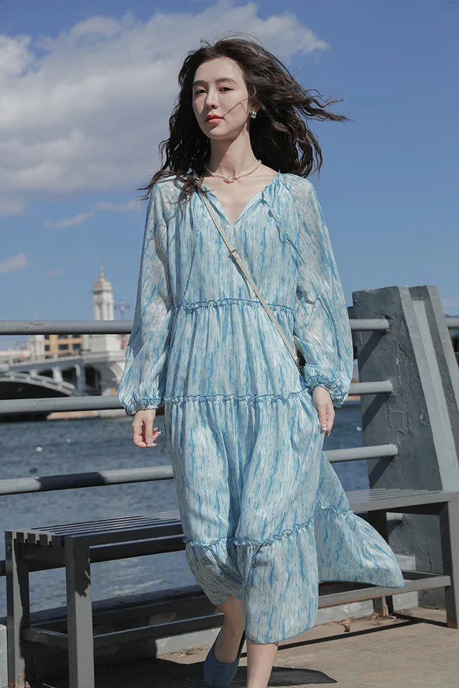 nvxiot  -  Spring 2024 new French floral holiday style long sleeved dress for women's fashion beach style dreamy blue beach long skirt