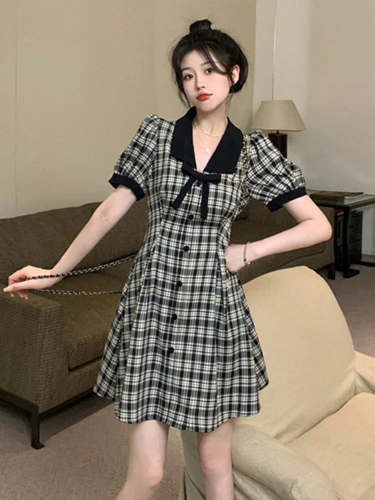 nvxiot  -  2024 Summer New Fashionable French Slimming Large Bow Bubble Sleeves Black and White Plaid Dress V-neck Short Skirt for women