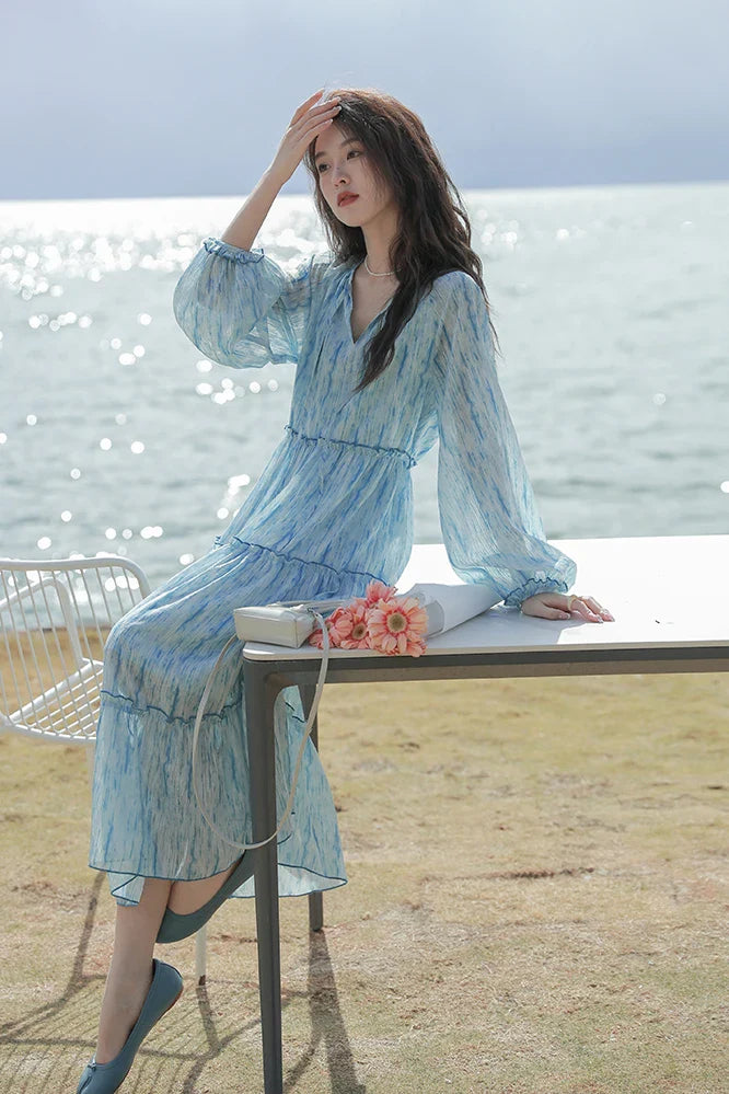 nvxiot  -  Spring 2024 new French floral holiday style long sleeved dress for women's fashion beach style dreamy blue beach long skirt