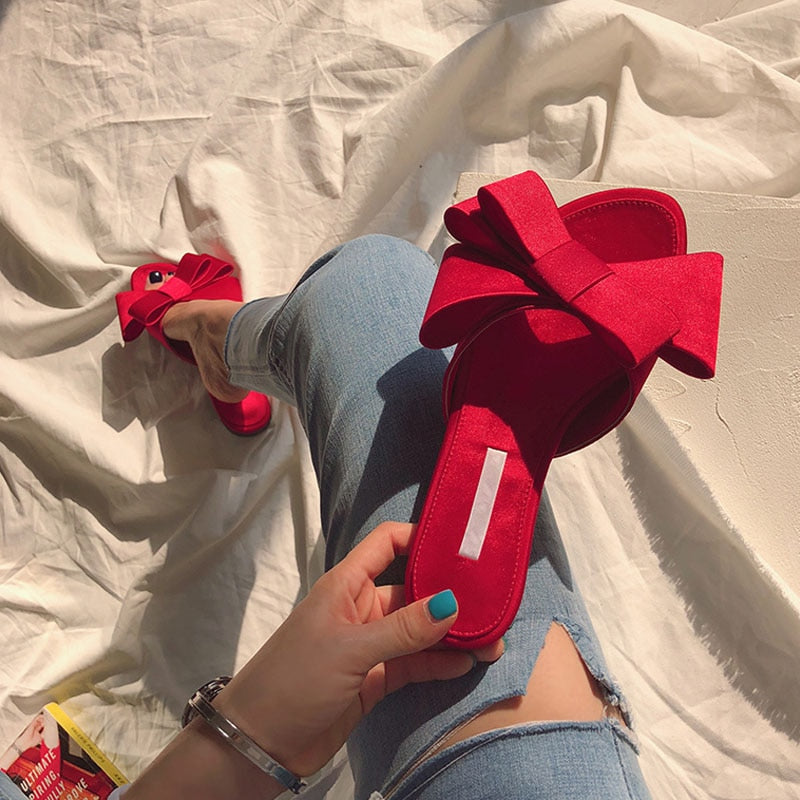 Wearing flat slippers women's shoes 2019 Korean version of the summer new large bow satin round head sandals Wild half slippers